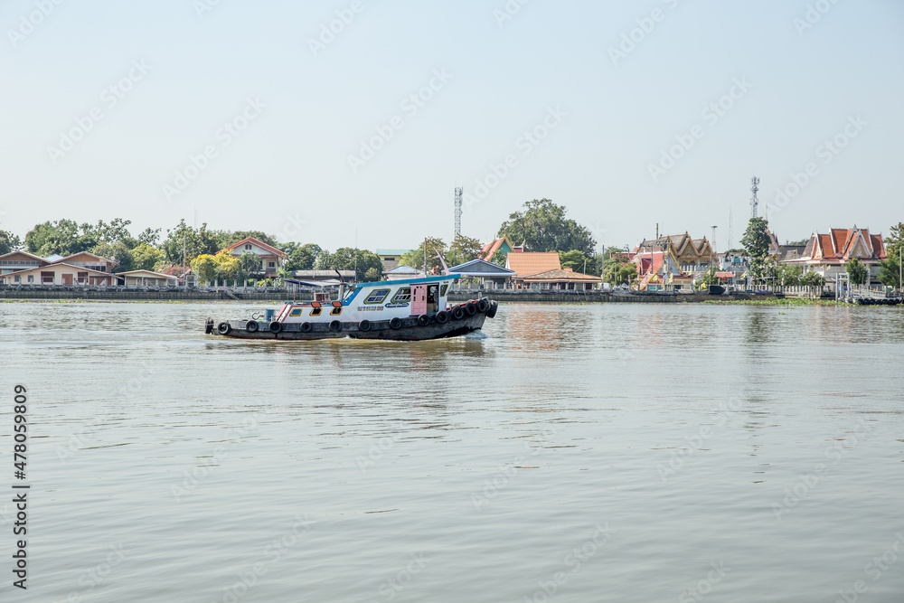The tugboat is moving in the Chao Phraya river, Thailand