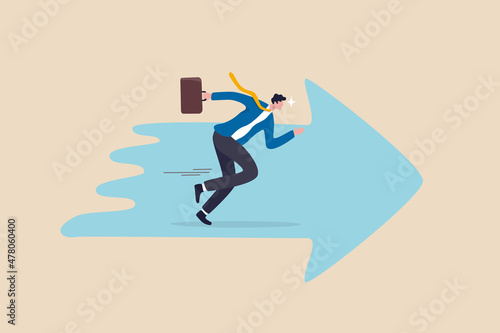Moving forward to achieve success, ambition or motivation to reach business target, career development or work effort concept, confidence ambitious businessman running forward on arrow symbol.
