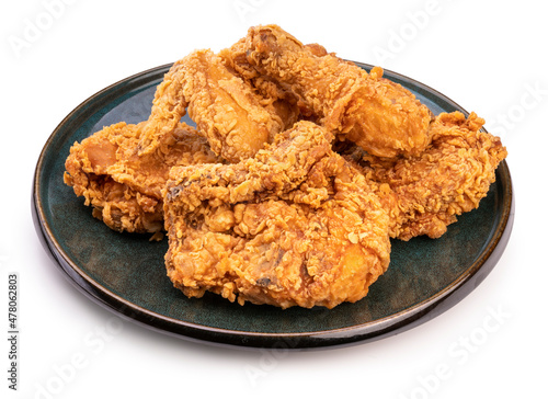 Fried chicken in black plate isolated on white background, Fried chicken on black With clipping path.