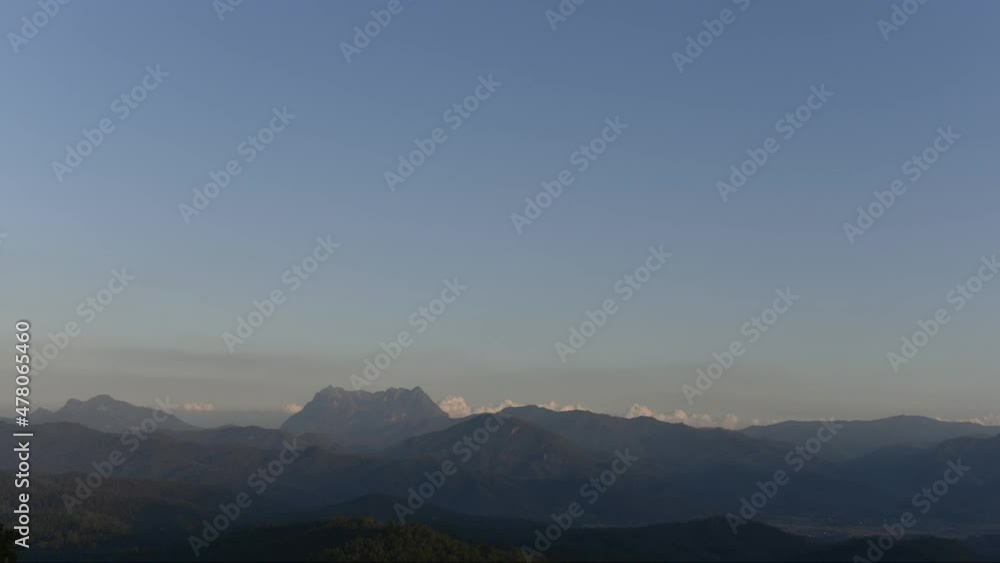 Cloud transforming over mountain top of Doi Luang Chiang Dao Mountain in a morning, Thailand Cloud transforming over mountain top of Doi Luang Chiang Dao Mountain in a morning, Thailand