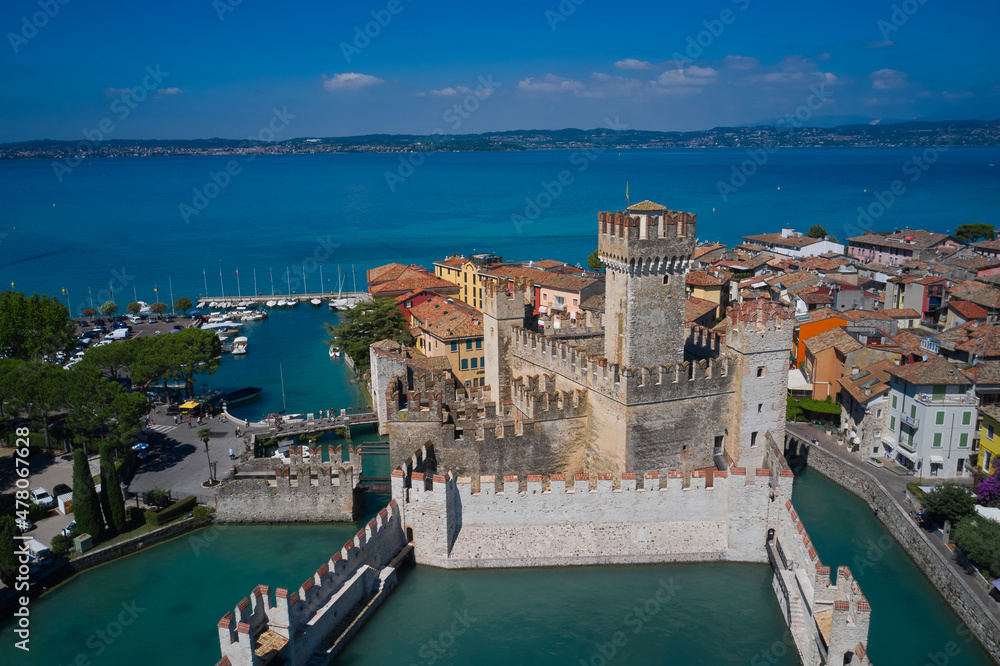 Aerial view on Sirmione sul Garda. Italy, Lombardy. View by Drone. Rocca Scaligera Castle in Sirmione. Close view of the castle.