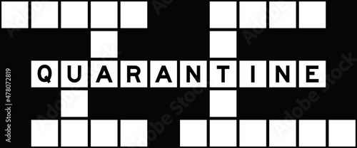 Alphabet letter in word quarantine on crossword puzzle background