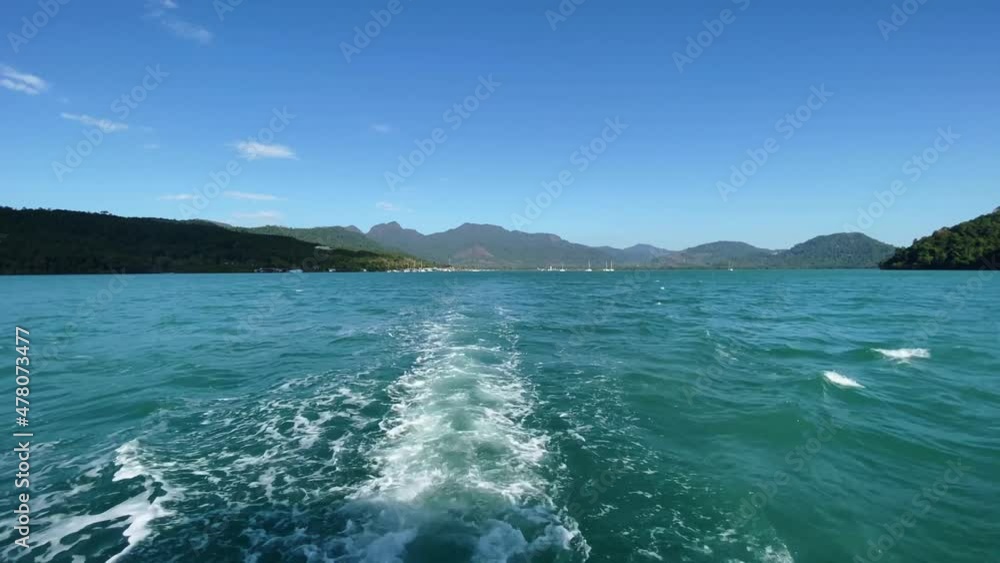 Beautiful natural landscape ocean view from the back of the boat. Beautiful natural landscape ocean view from the back of the boat.