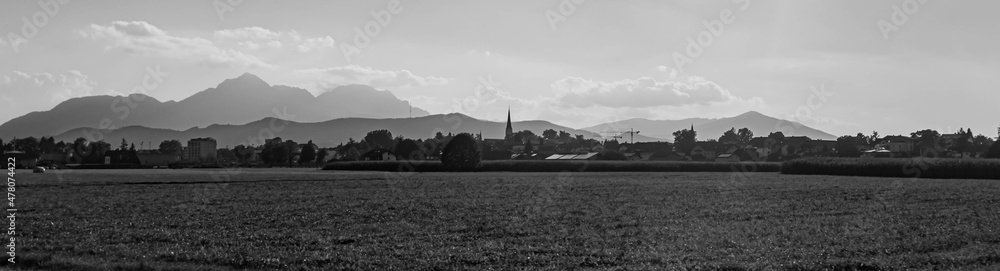 Beautiful black and white alpine summer view with the famous Hochstaufen summit in the background near Freilassing, Bavaria, Germany