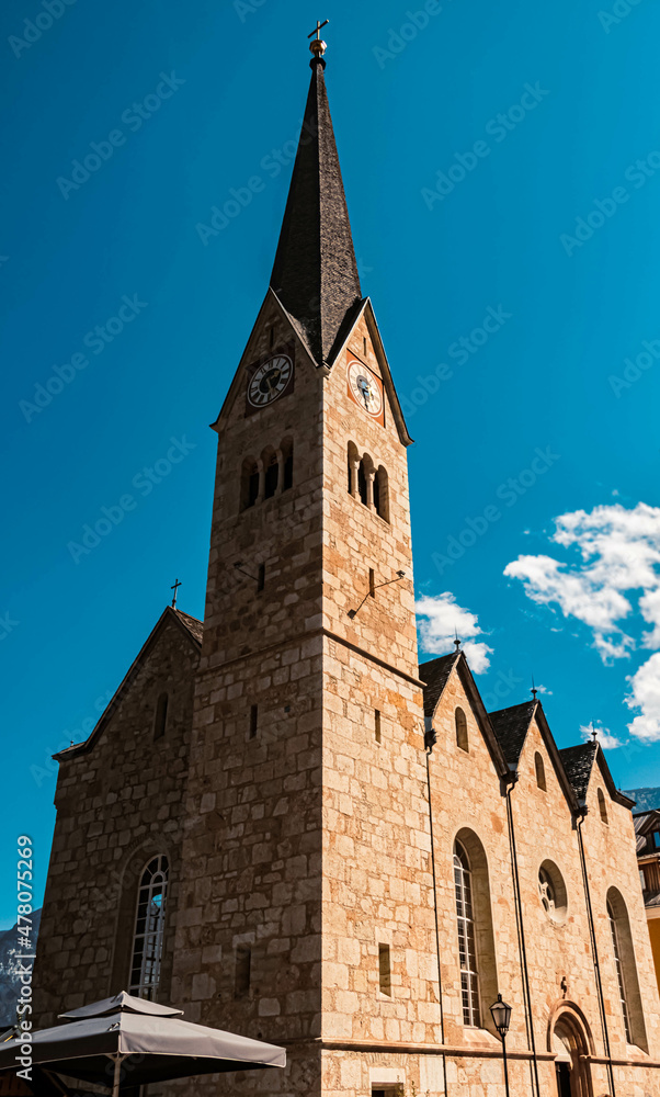Beautiful church on a sunny summer day at Hallstatt, Upper Austria, Austria