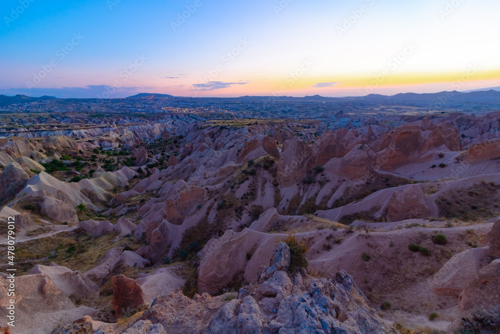 Cappadocia sunset view. Kizilcukur Valley in Cappadocia at dusk background