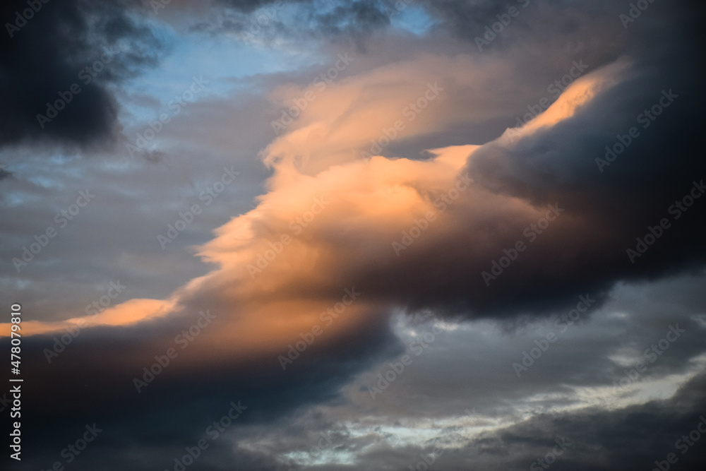 Sunlight on dark clouds in the sky Sunlight on dark clouds in the sky