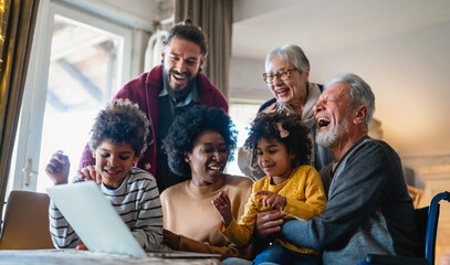Portrait of a happy multigenerational multiethnic family at home.