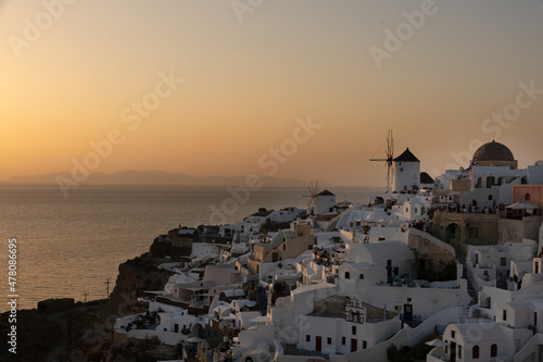 The windmills of Oia, Santorini, Greece, during sunset