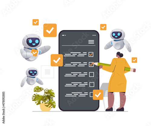 businesswoman with robots marking complete tasks on checklist in mobile app organization artificial intelligence