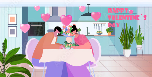 couple eating spaghetti together happy valentines day holiday dinner concept