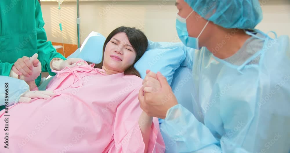 pregnant woman in delivery room pregnant woman in delivery room