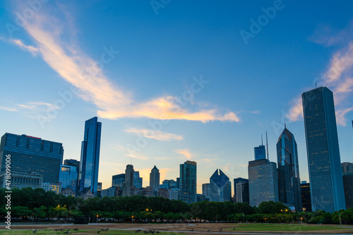 Chicago skyline panorama from Park at sunset. Chicago, Illinois, USA. Skyscrapers of financial district, a vibrant business neighborhood.