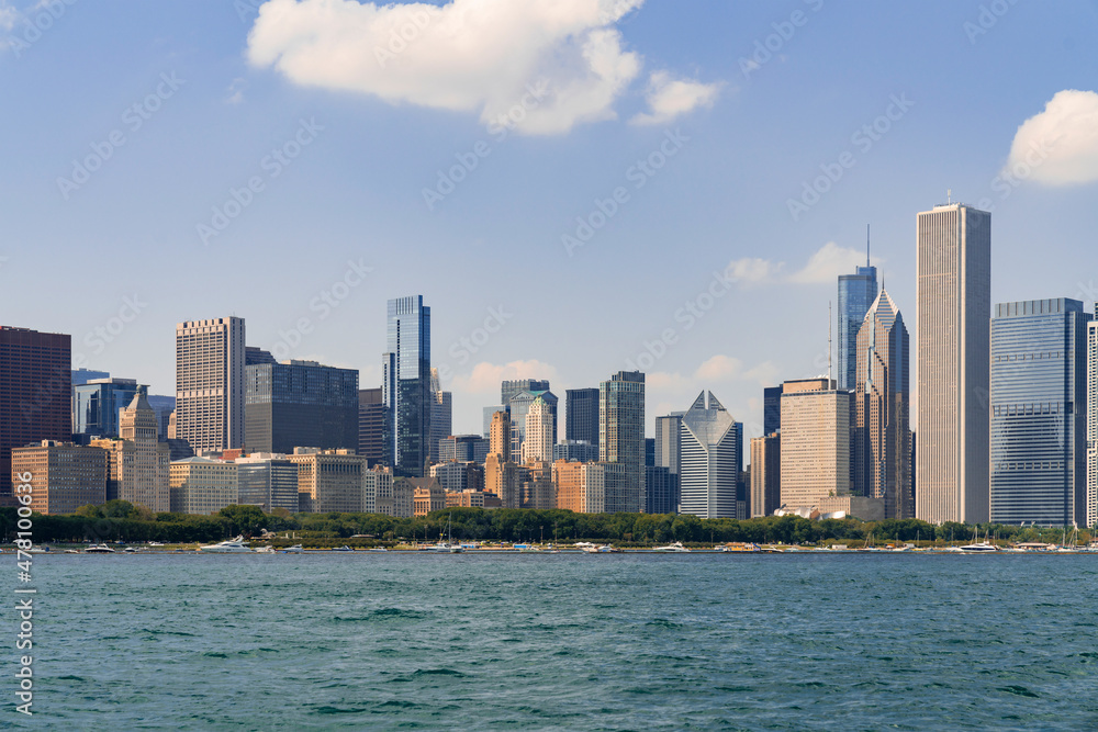 A picturesque view of Downtown skyscrapers of Chicago skyline panorama over Lake Michigan at daytime, Chicago, Illinois, USA
