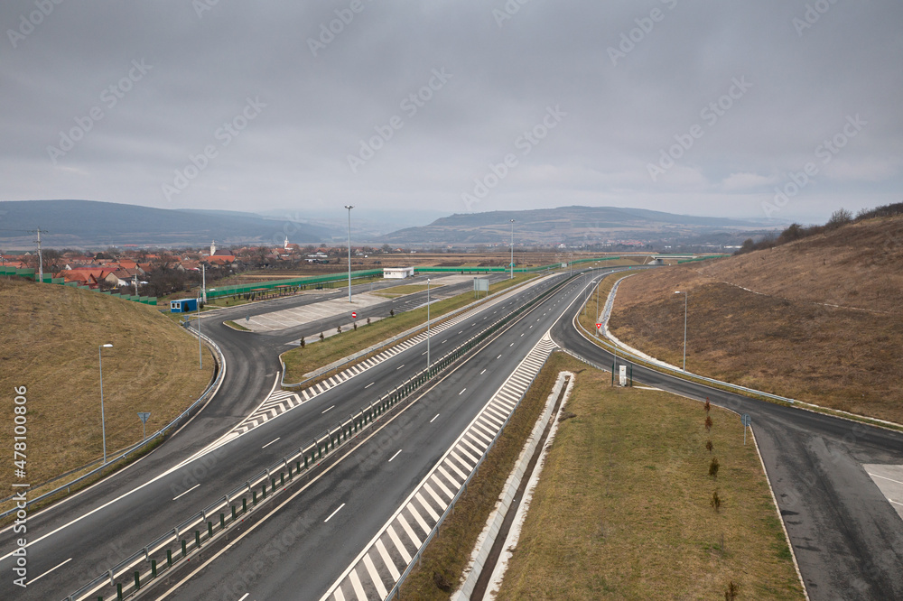 Highways in Romania. Aerial view of the A10 road from Alba-Iulia to Turda, Cluj-Napoca cities. High speed road as infrastructure industry.