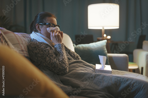 Tableau sur toile Sick woman with cold resting at home