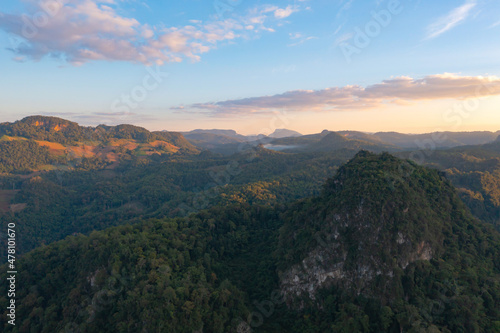 Aerial top view of forest trees and green mountain hills. Nature landscape background  Thailand.