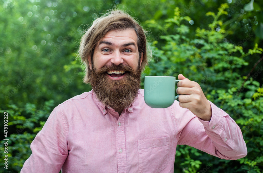 bearded man drinking beverage. mature hipster with beard drink coffee. brutal caucasian hipster hold tea cup. male perfect morning. happy businessman in shirt with mug bearded man drinking beverage. mature hipster with beard drink coffee. brutal caucasian hipster hold tea cup. male perfect morning. happy businessman in shirt with mug