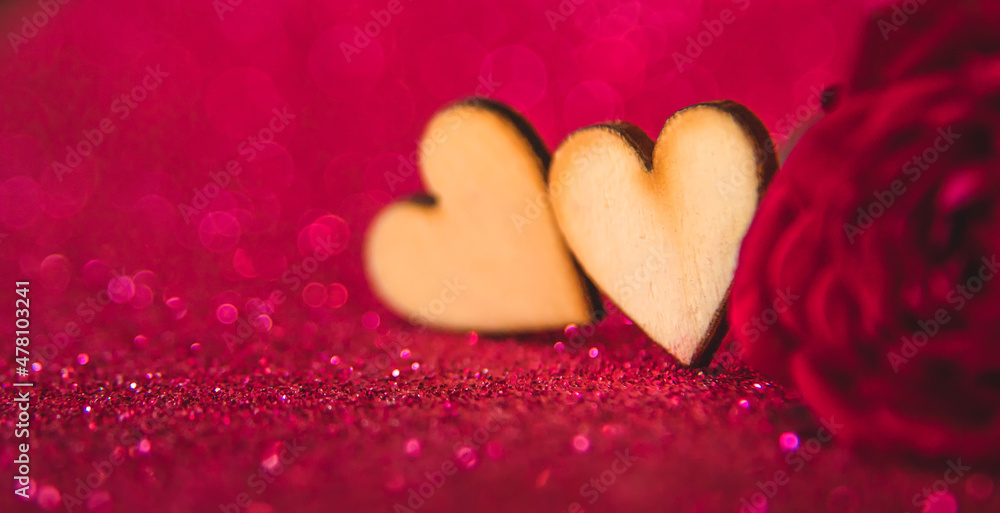 Shiny background with valentine heart. Selective focus.