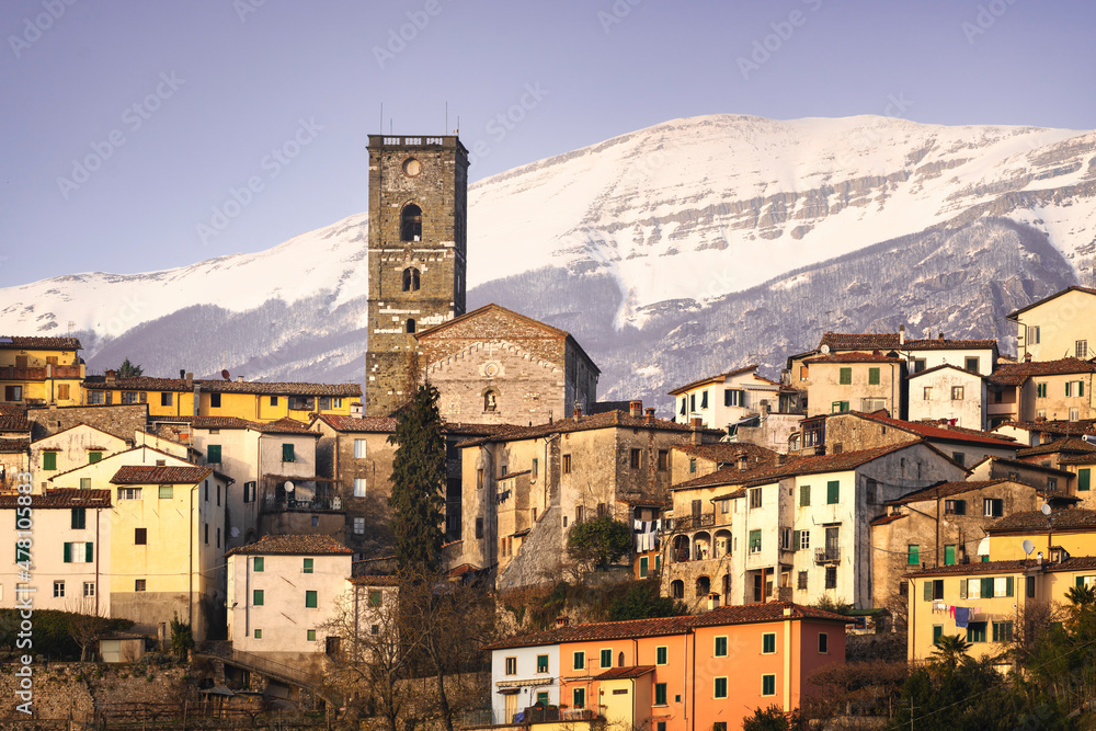 Coreglia Antelminelli village and snowy mountains on background. Garfagnana, Tuscany, Italy.