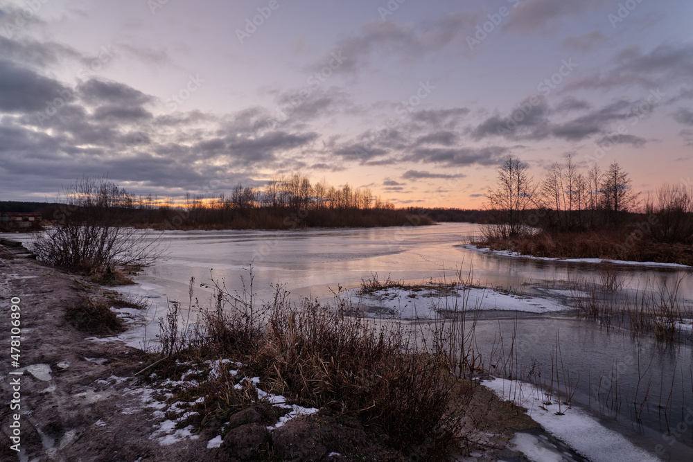 sunrise over the river in winter