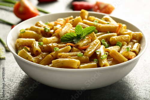 Homemade delicious breakfast food- vegetarian diet meal- pasta penne with fresh cream and cheese.