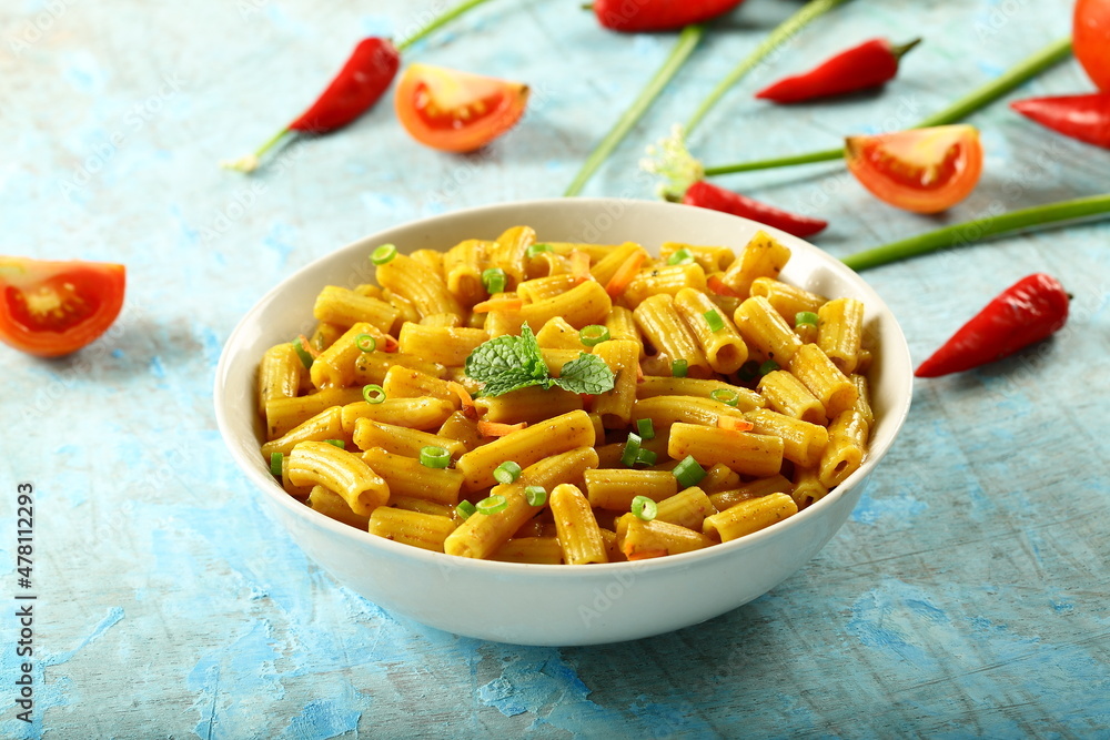 Bowl delicious vegan diet meal- cheese pasta penne with herbs.