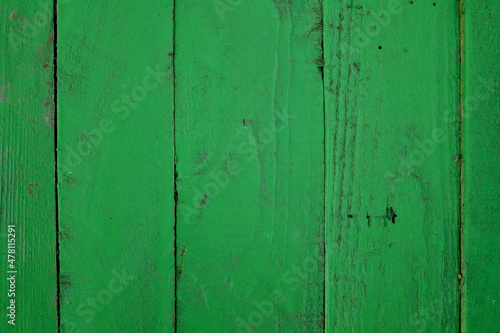 Wooden surface from boards painted green, background