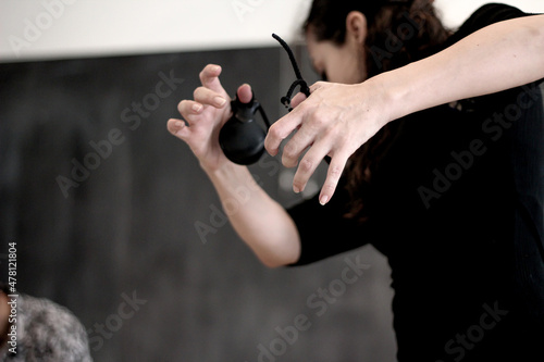 woman dancing in a black dress