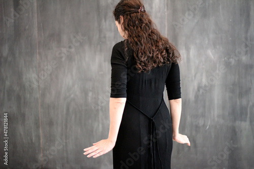 woman in a black dress