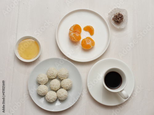 breakfast with coffee and tangerine, raffaello 