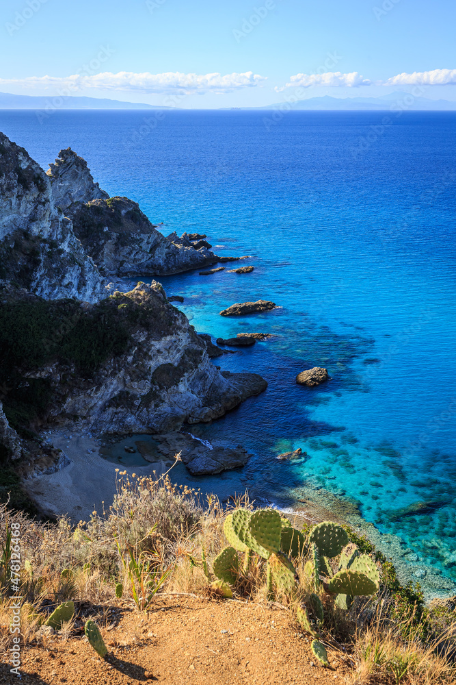 Cliffs and turquoise water in Italy