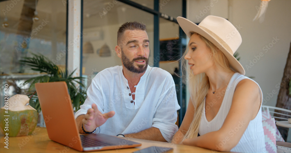 Young caucasian couple on business trip overseas having conference with employer
