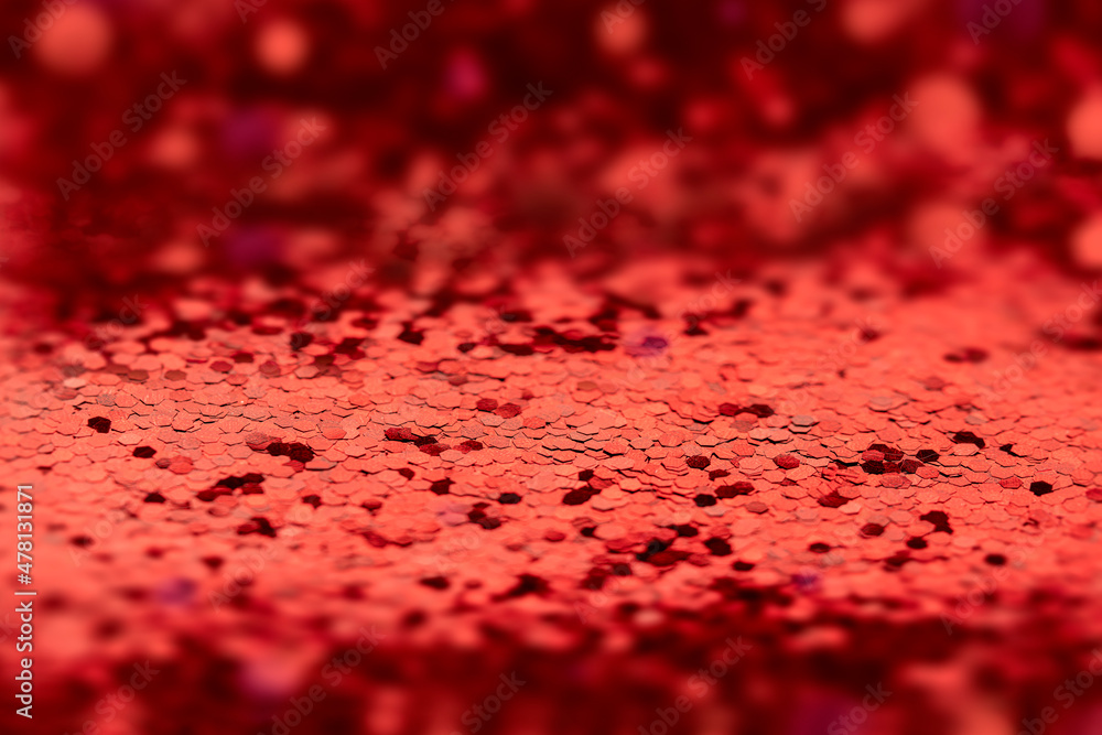 red background of bright shiny confetti in out of focus. empty copyspace layout for valentine's day template or valentine's day products red background of bright shiny confetti in out of focus. empty copyspace layout for valentine's day template or valentine's day products