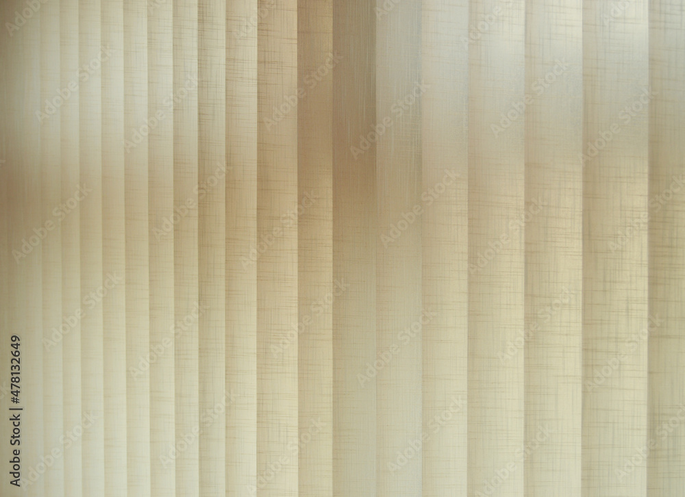 Fototapeta premium Graduation of ambient natural light from windows. Blinds with vertical slats in fire retardant fabric to regulate ambient light
