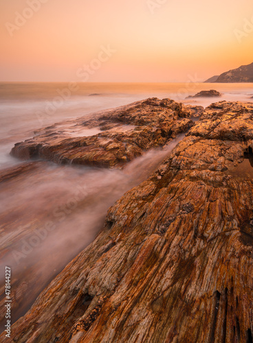 waves and rocks in long exposure