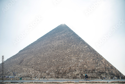 Landscape of the pyramids in the desert with blue sky in Giza, Egypt	 photo