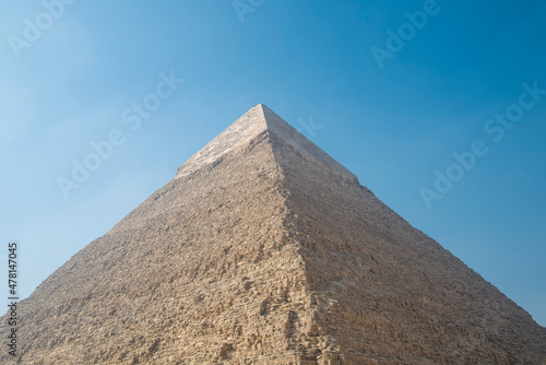 Landscape of the pyramids in the desert with blue sky in Giza, Egypt 