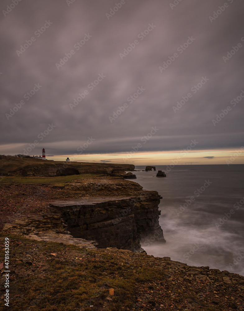 The view along Marsden Bay near Sunderland, of the cliffs and the Sandstone Sea stacks, as the tide comes in