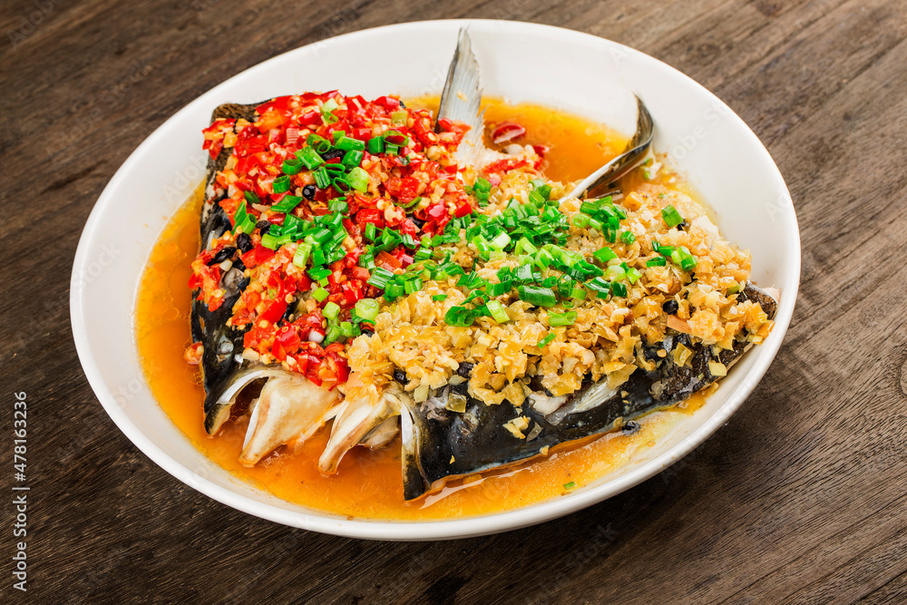 Steamed fish head with diced hot red peppers Steamed fish head with diced hot red peppers