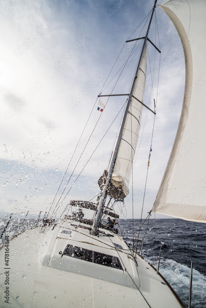 Fototapeta premium Sailing yacht in action in the evening in Mediterranean