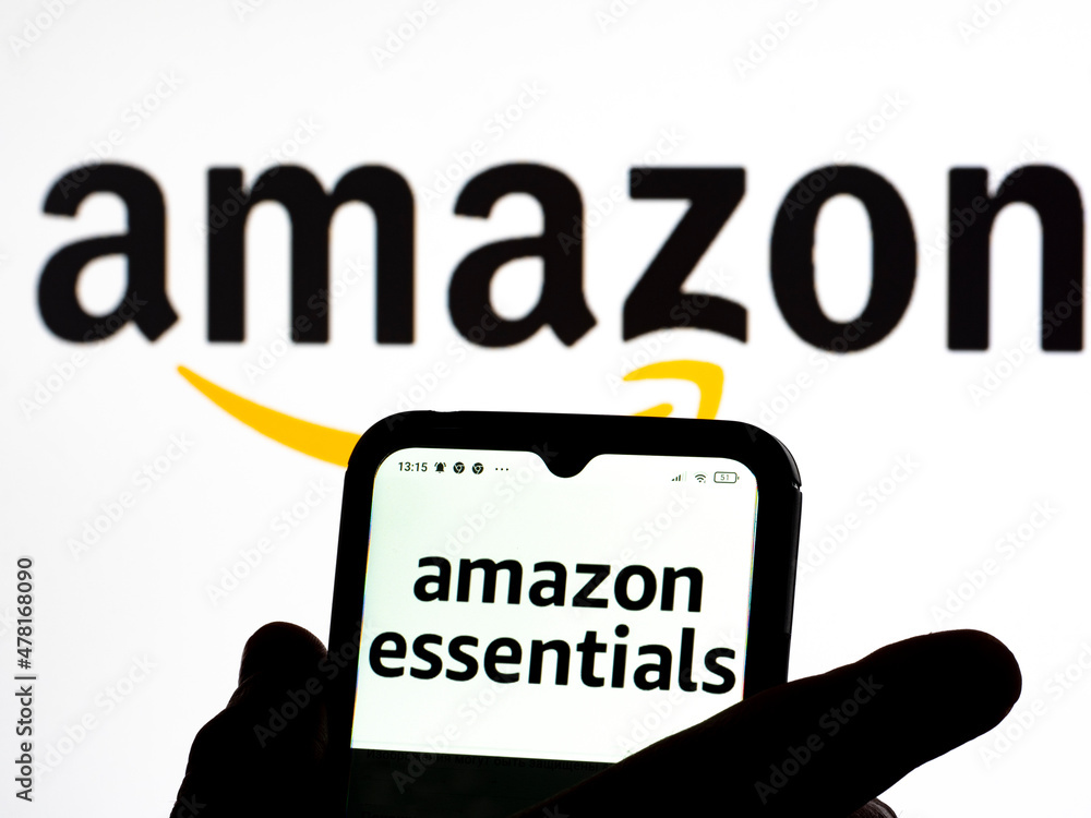 In this photo illustration  Essentials logo seen displayed on a  smartphone Stock Photo
