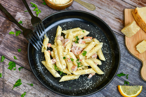  Fresh home made italian penne pasta alla carbonara with cream sauce , bacon,egg, parmesan cheese ,olive oil and black pepper) 