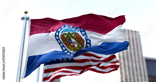 Wallpaper Mural the flag of the US state of Missouri waving in the wind with the American flag blurred in the background Torontodigital.ca