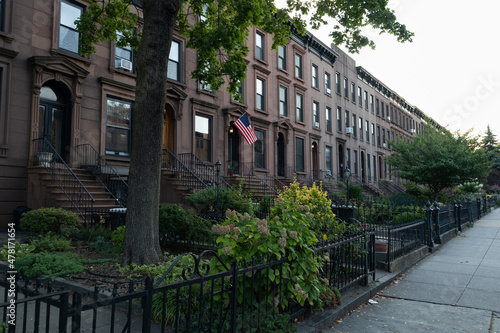 Row of Old Residential Buildings along a Sidewalk in Carroll Gardens Brooklyn of New York City