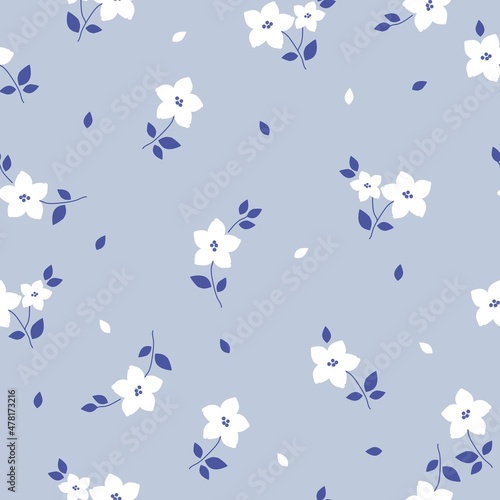 Beautiful vintage floral pattern. White flowers, blue leaves. Light blue background. Floral seamless background. An elegant template for fashionable prints.