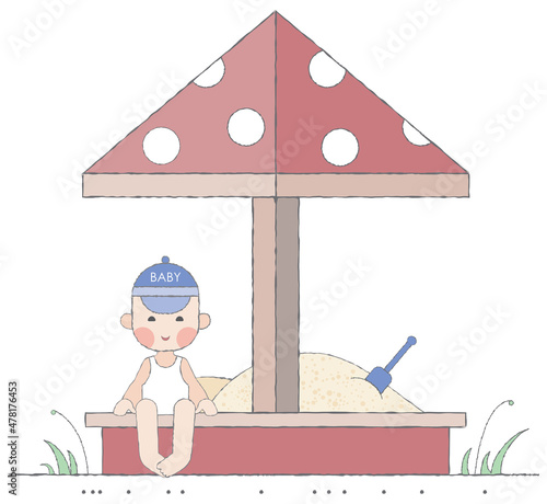 Boy playing in the sandbox