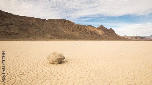 Time lapse of the clouds above the famous moving rocks on the Race Track dry lake in Death Valley
