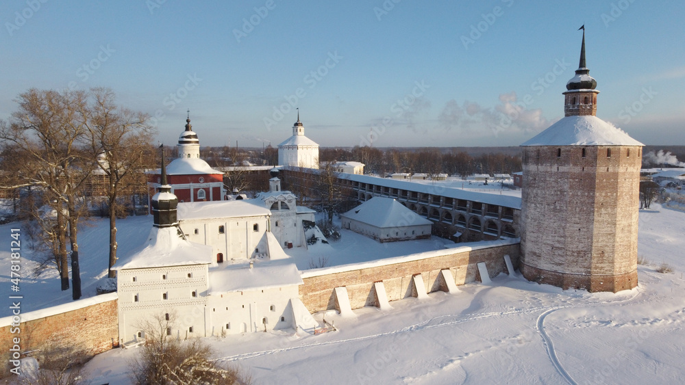 Wonderful winter landscape with a view of the tower of an ancient Orthodox monastery