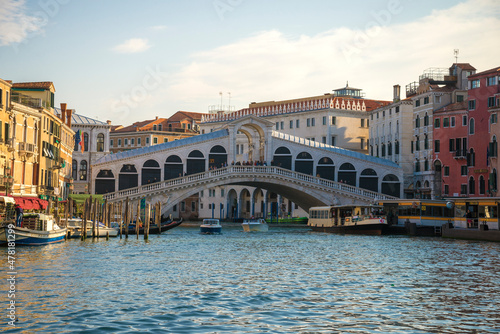 View of the Rialto Bridge on the Grand Canal on a sunny September evening. Venice, Italy